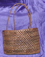 woman woven handbag by art export bali indonesia